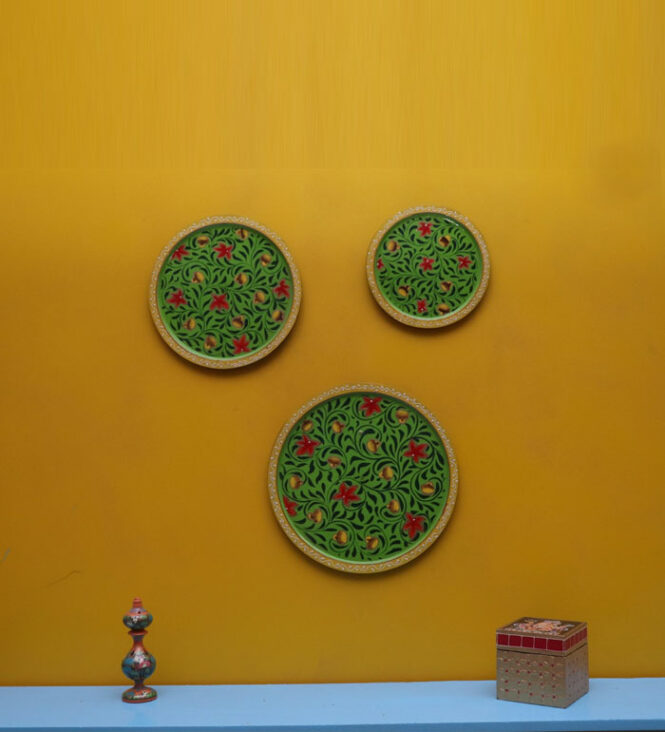 green wooden wall plates
